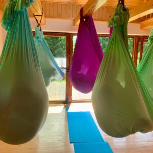 Top 5 Benefits of Aerial Yoga for Stressed, Stiff & Sedentary Bodies