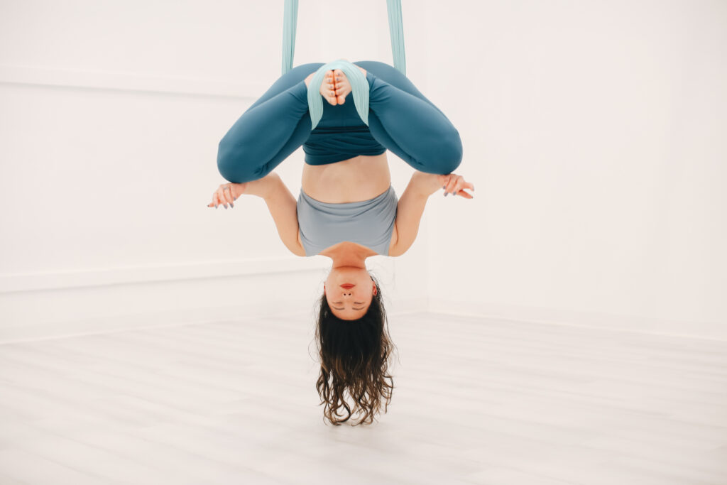 7 Surprising Benefits of Hanging Upside Down in Aerial Yoga